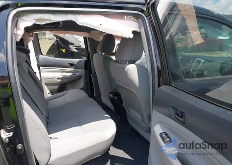 2015 Toyota Tacoma Base V6 z USA, uszkodzony, nr VIN 5TFLU4EN6FX144939